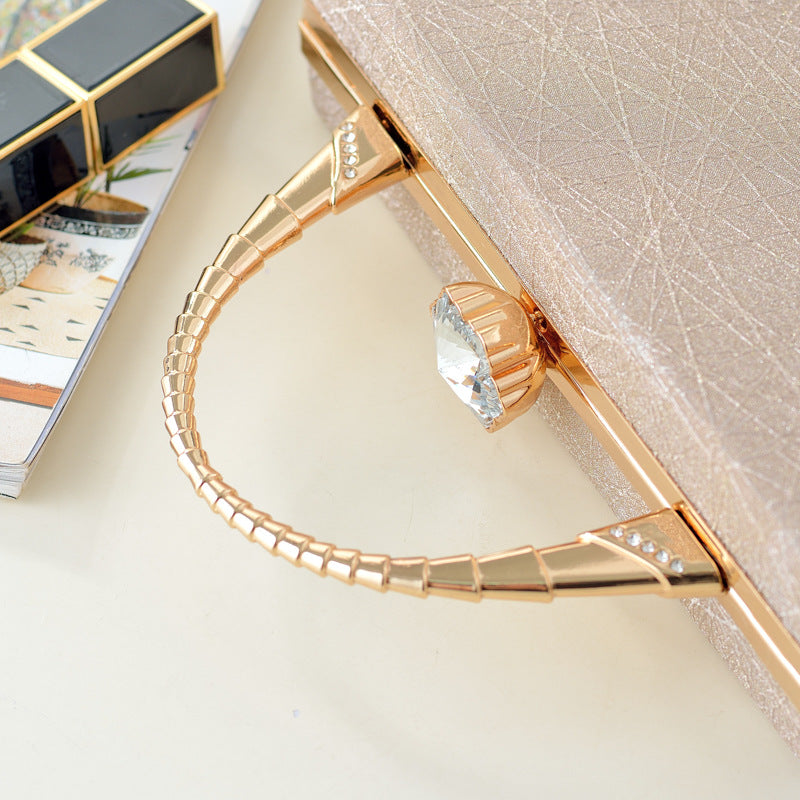 Golden Sparkle Diamond Handle Clutch - FIORENE