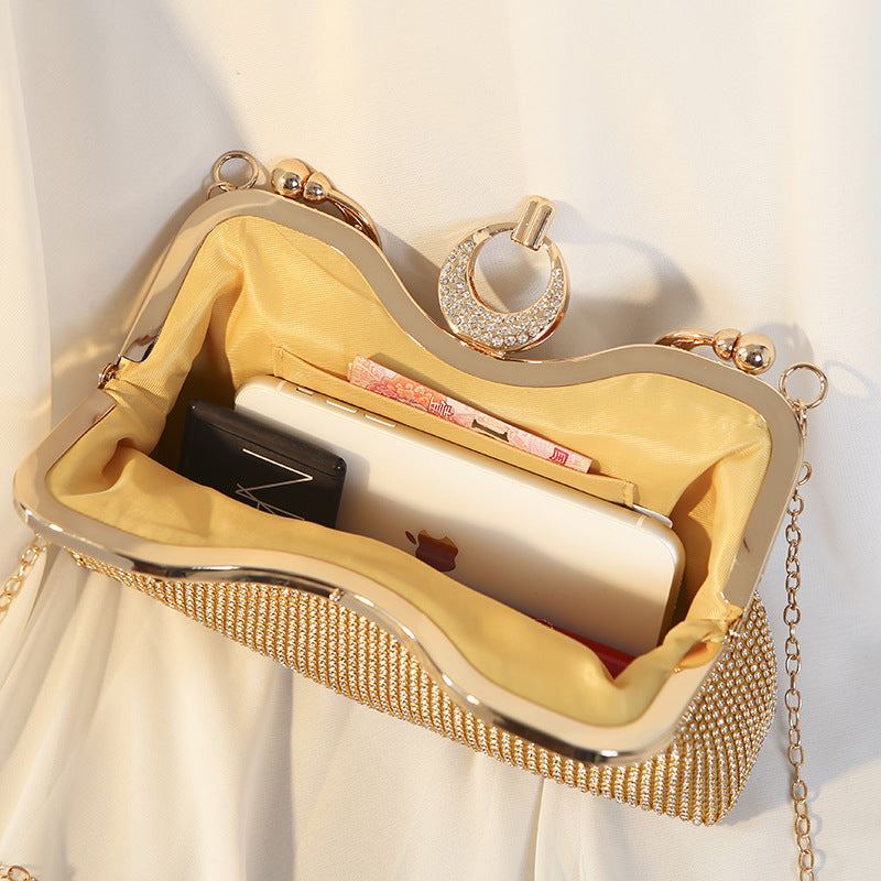 Gilded Radiance Frame Clutch – FIORENE
