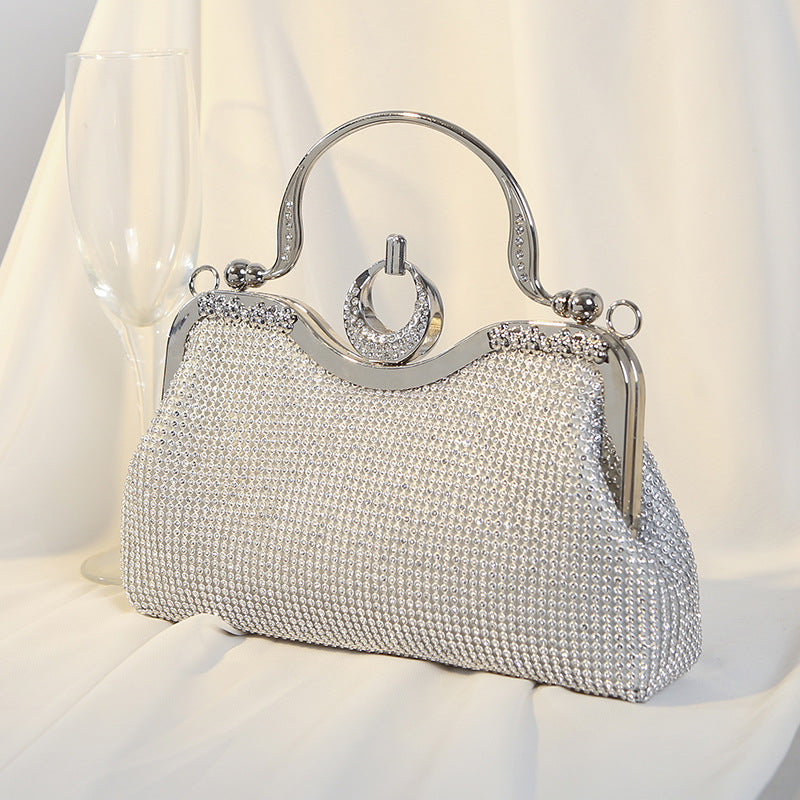 Gilded Radiance Frame Clutch – FIORENE