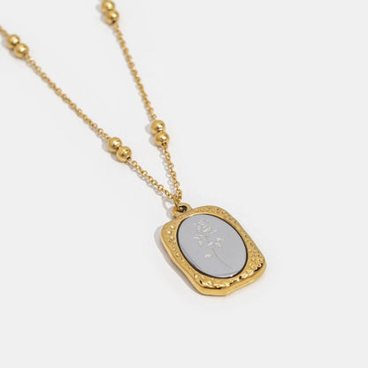 Embossed Petal Emblem Necklace – FIORENE