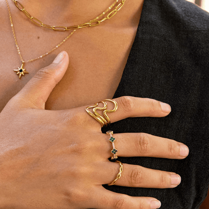 Golden Fluid Silhouette Ring – FIORENE