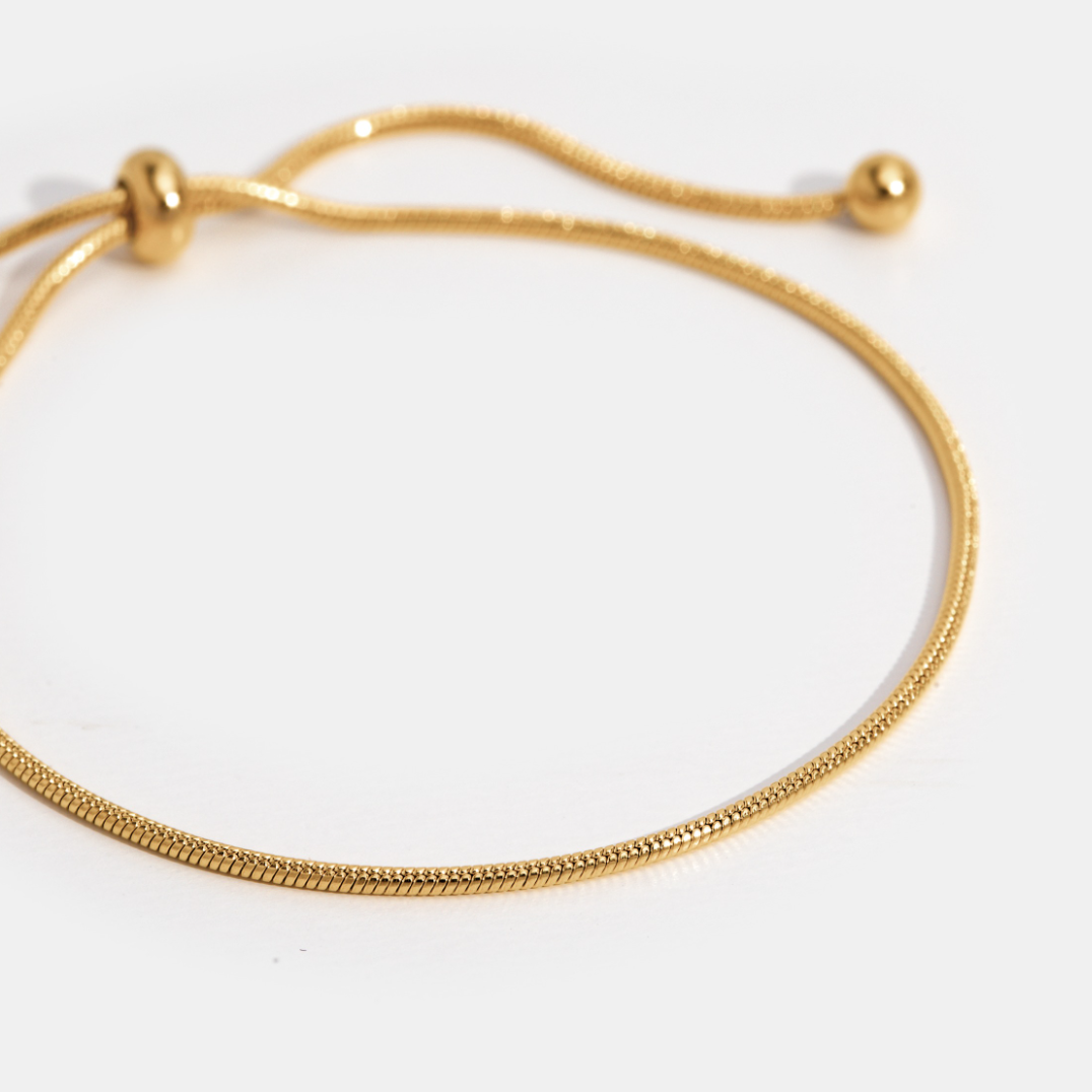 Luminous Golden Sleek Bolo Slider Bracelet – FIORENE