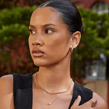 Radiant Gilded Teardrop Studs – FIORENE