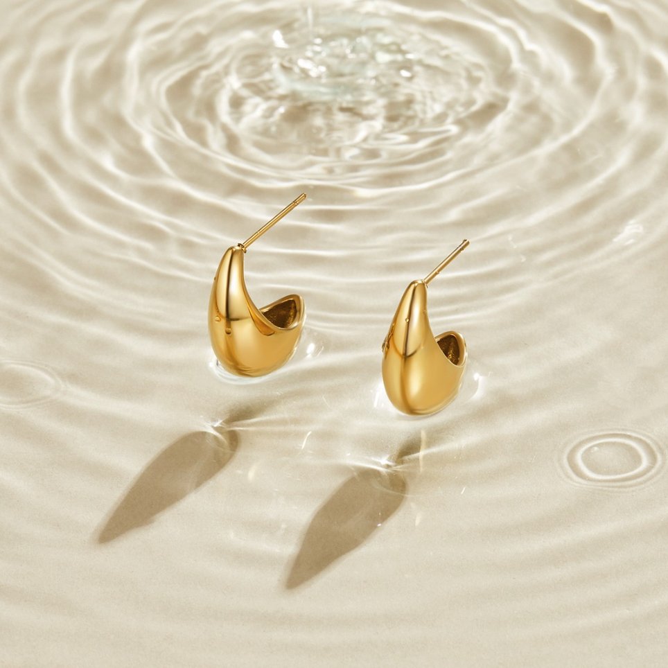 Radiant Gilded Teardrop Studs – FIORENE