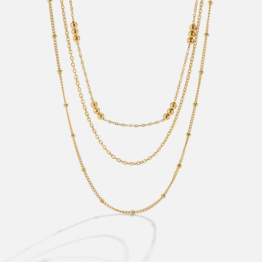 Golden Polished Bead Tiered Necklace – FIORENE